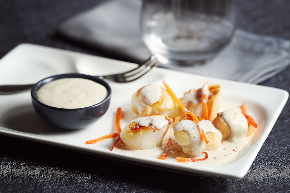 Image mise en avant illustrant la recette "Scallops with Cream & Truffles"