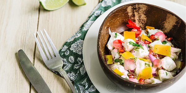 Image de cover représentant la page "Sea bream ceviche with pomegranate and Extra-Mature Mimolette" de la société d'Isigny-Sainte-Mère