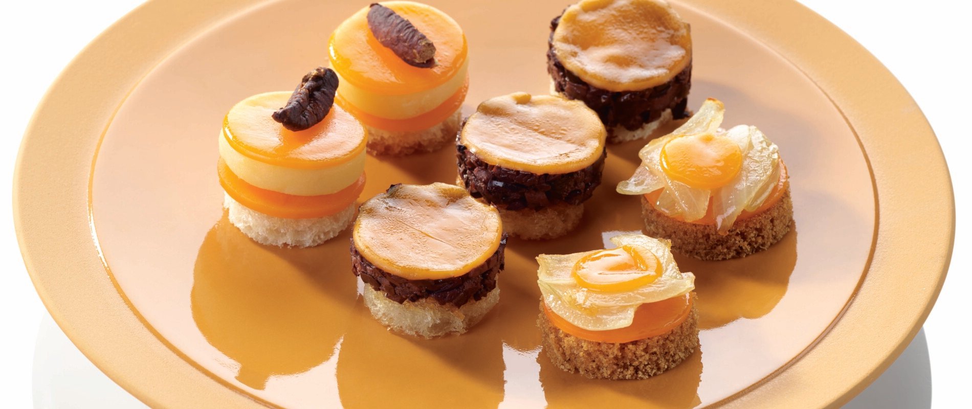 Image de cover représentant la page "Mimolette aperitif toasts" de la société d'Isigny-Sainte-Mère