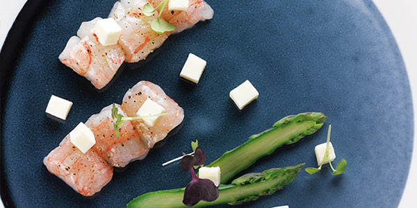 Image de cover représentant la page "Langoustines marinées, asperges et crème" de la société d'Isigny-Sainte-Mère